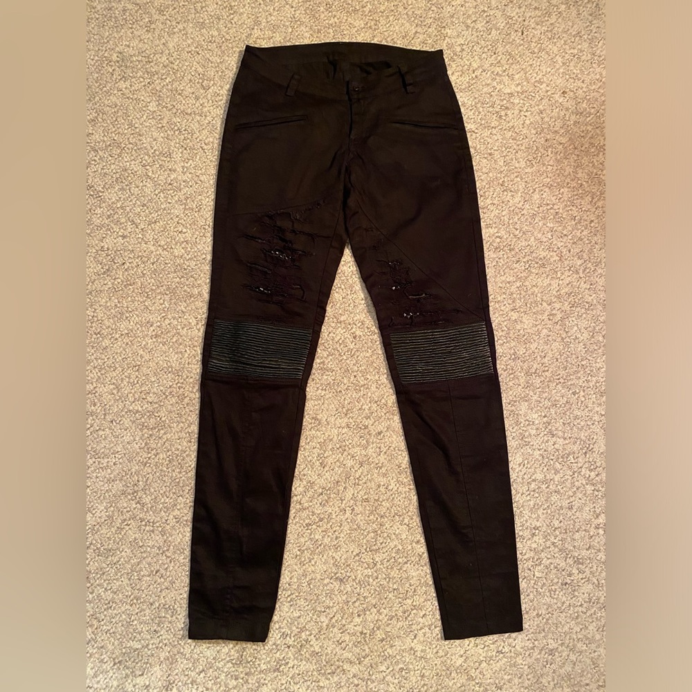 Festival pants with leather and accent button, reinforced rips